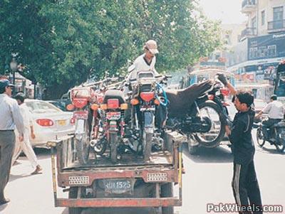 fat people on motorcycles. from the people#39;s bribery