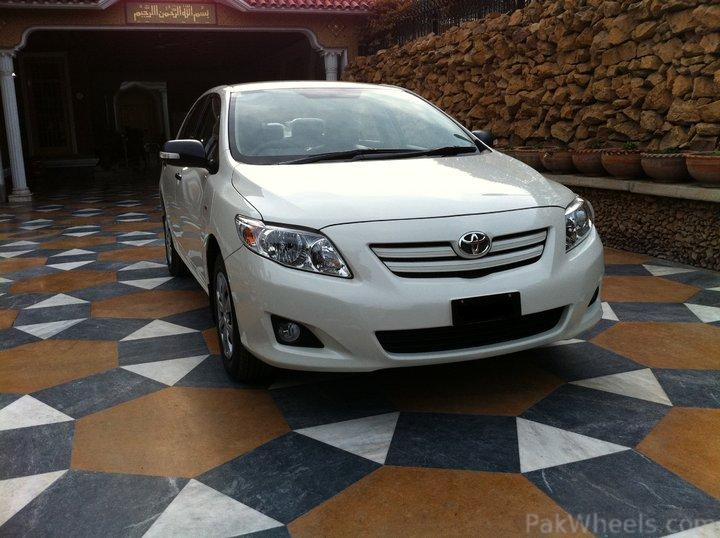 http://cache.pakwheels.com/forums/2010/attachments/Members---Member-Rides/206938-corolla-2010-for-sale-Picture-1.jpg